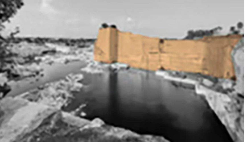Quarry study highlighting the retained stone wall beside the water basin.